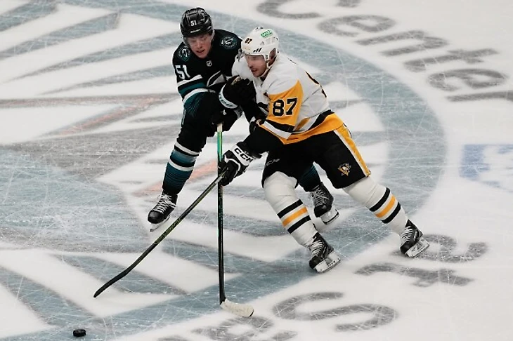 Sidney Crosby and Evgeni Malkin score, Tristan Jarry has 31 saves as Penguins beat Sharks 3-0 | AP News