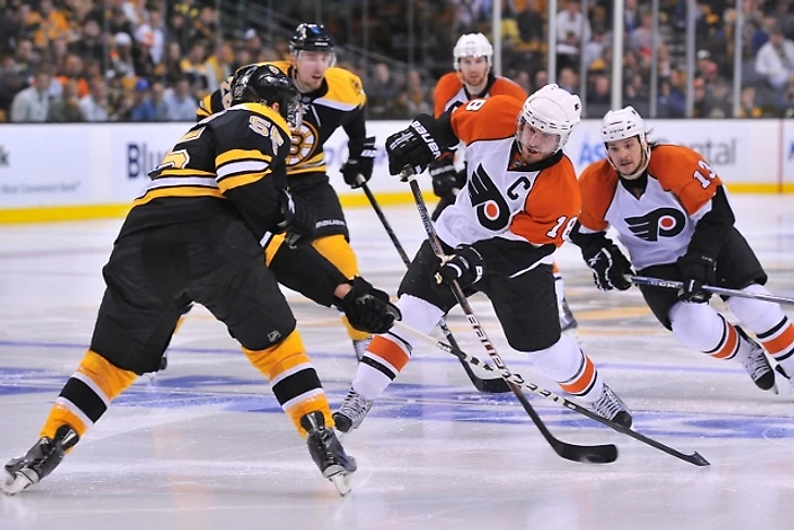 BOSTON – MAY 14: Mike Richards #18 of the Philadelphia Flyers skates with the puck against the Boston Bruins in Game Seven of the Eastern Conference Semifinals during the 2010 NHL Stanley